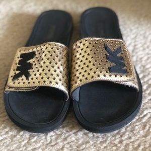 SOLD: Gold Michael Kors Slides